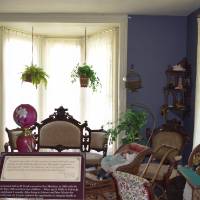 Picture inside of house in Fort Mackinac. Living room designed in 1800's decor.